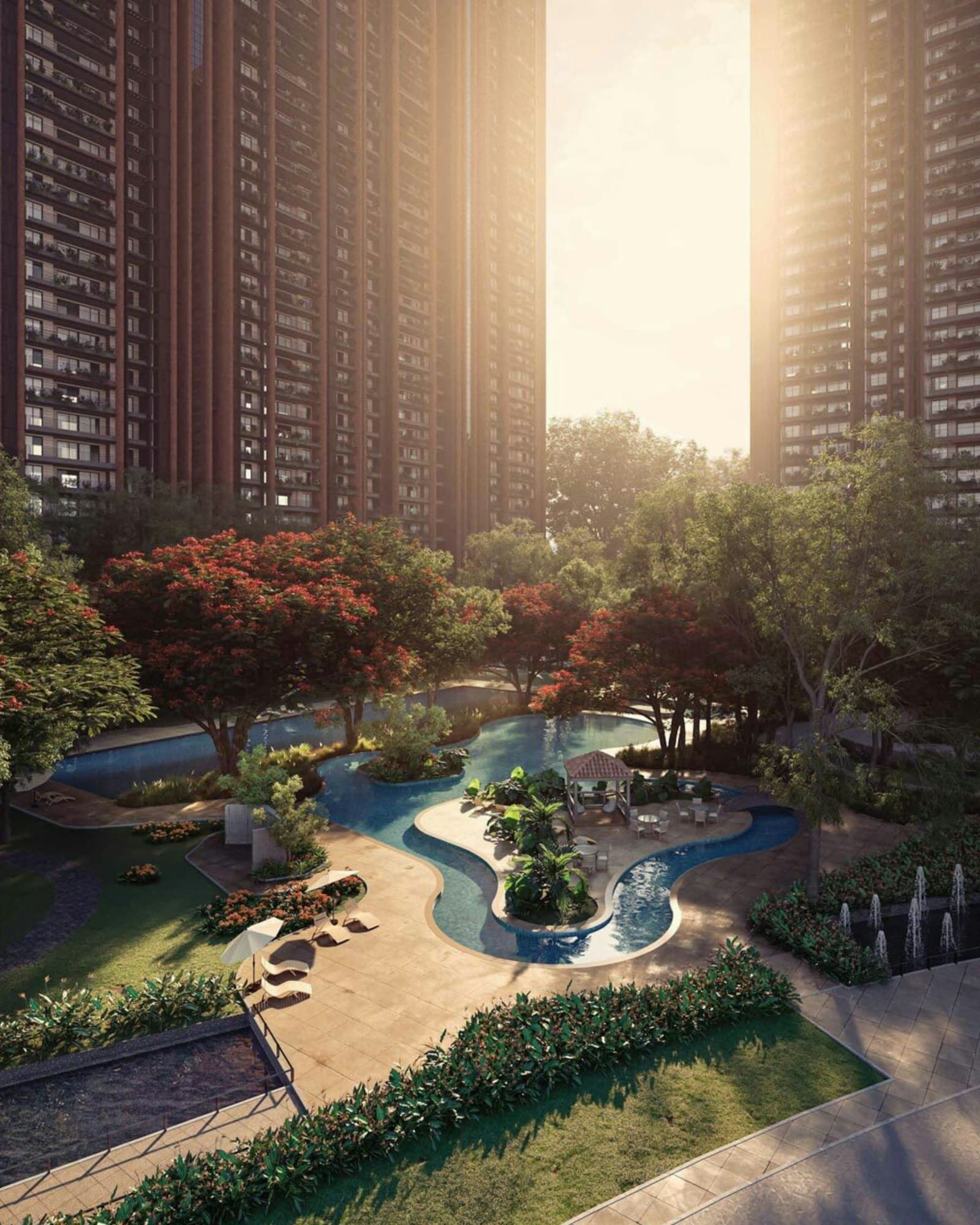 Park ve süs havuzu olan modern bir konut sitesi